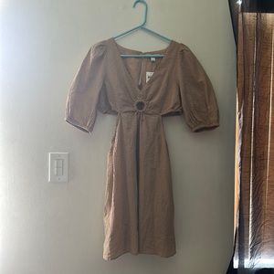 AND NOW THIS woman dress